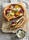 Autumn quiche made from cheese dough with beets