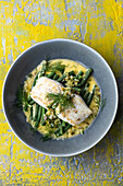 Hake with green beans and butter sauce