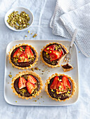 Chocolate tartlets with strawberries