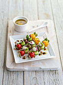 Vegetable skewers with anchovy oil