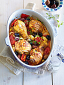 Basque chicken with tomatoes, peppers and olives