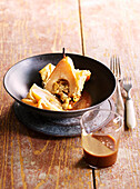 Baked pears in filo pastry with caramel sauce