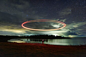 Circular light painting in the sky
