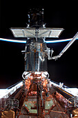 Astronauts servicing the Hubble Space Telescope