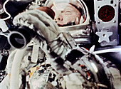 NASA astronaut John Glenn using binoculars
