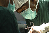 Surgeon operating on a patient