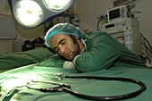 Young surgeon resting