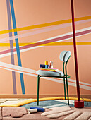 Wall decorated with washi tape (Japanese adhesive tape made of rice paper), in front of a chair