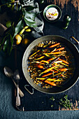 Roast heirloom carrots with freekeh, spiced pepita and hazelnut salad