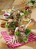 Four kinds of meatballs in a jar