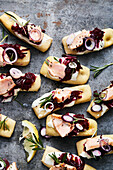Mini focaccias with roasted salmon and beetroot