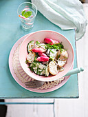 Jacket potato and cucumber salad with dill and caramelised radishes