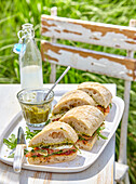 Caprese sandwiches with homemade basil pesto