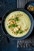 Cauliflower and Brussels Sprout Soup with pine nuts and cress micro greens