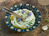 Herb curd cheese with borage flowers