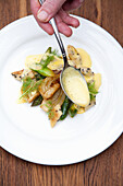 Braised fennel and green asparagus with orange sauce