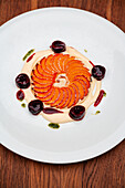Apricot tart with champagne Zabaione and cherry ragout