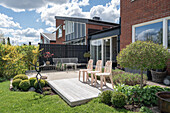 Sunny terrace outside brick house