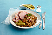 Sour lentils with smoked pork