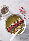 Healthy bowl with matcha tea smoothie