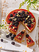 Upturned (turn over) cake with blackberries
