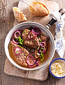 Veal liver with red onions and wine