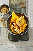 Millet grain pudding with caramel pears