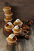 Muffins with cream and caramelized nuts