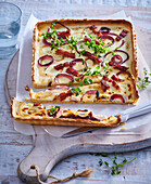 Quiche with red onions