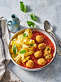 Pasta with chickpea balls in tomato sauce
