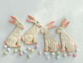 Baked puff pastry bunnies with sugar icing and sugar eggs