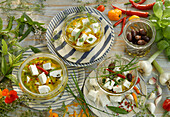 Pickled feta cheese with herbs and spices
