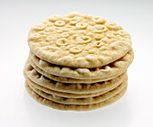 A stack of Pita Bread on a white background