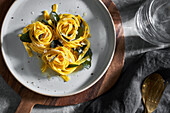 Sage wrapped in tagliatelle nests with parmesan cheese