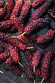 Fresh ripe Mulberries on dark background