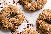 Simit Bread covered with sesame seeds on greaseproof paper (Turkey)