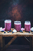 Blueberry smoothies in glass jars