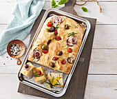 Focaccia with cherry tomatoes and olives