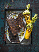 Dry Rubbed Smoked Ribs and sweetcorn