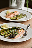 Freshly grilled salmon and asparagus, served on a plate