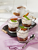 Plum mousse with chocolate biscuits and cream