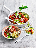 Courgette noodles with vegetarian meatballs and tomato sauce