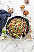 Rice salad with sunflower seeds, cashew nuts and sultanas