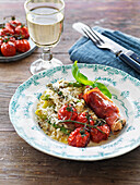 Risotto with asparagus, baked tomatoes, chicken with serrano, basil