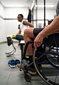 Wheelchair and amputee athletes in locker room