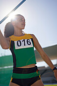 Female track and field athlete throwing javelin