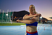 Female athlete preparing for competition on track