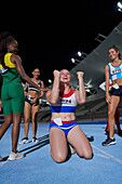 Excited athlete celebrating victory after race