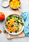 Pasta with pumpkin sauce and Spinach salad with pear slices