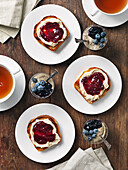 Toast with jam, tea, chiapudding with blueberries and blueberryjam